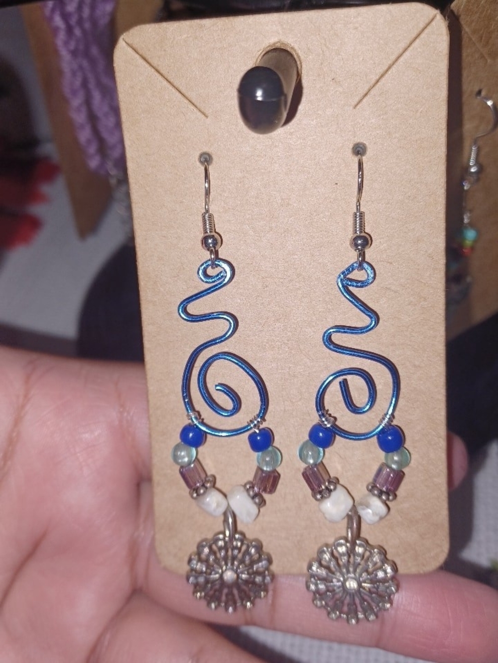 Blue Unalome Earrings with Floral Charm